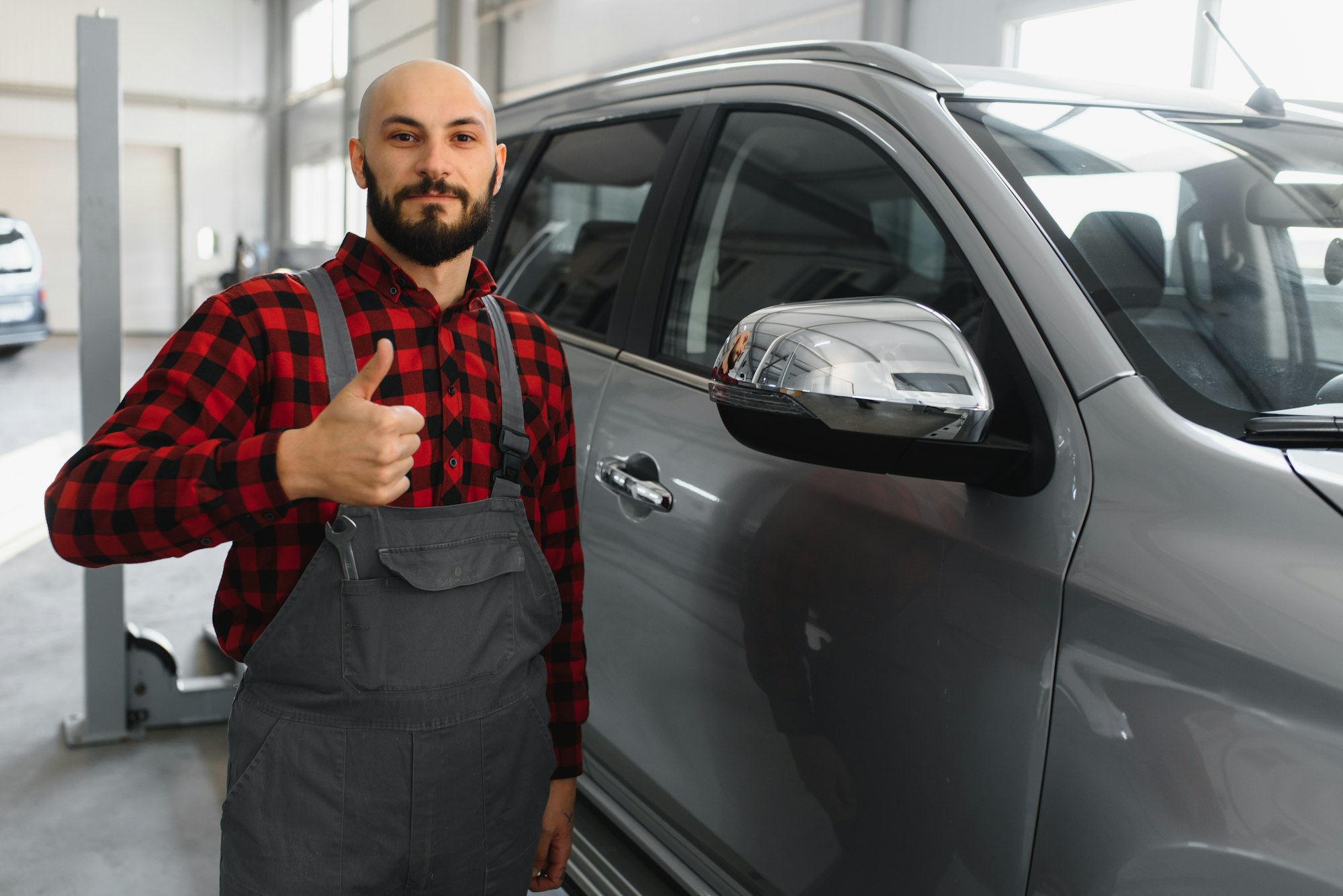 Auto mechanic working at auto repair shop